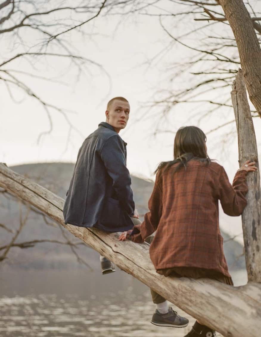 man and women sitting in a tree