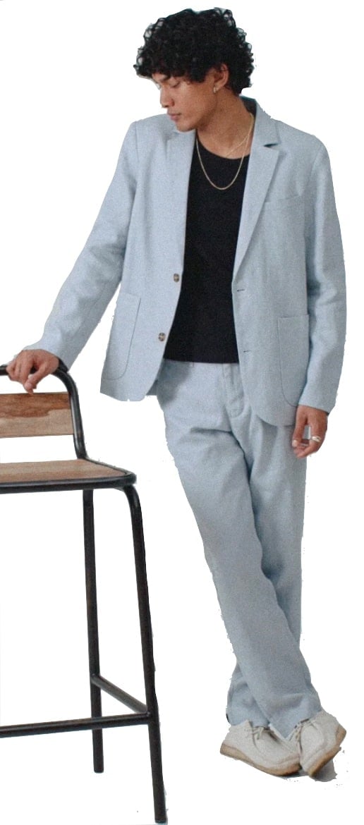 model wearing a light blue suit