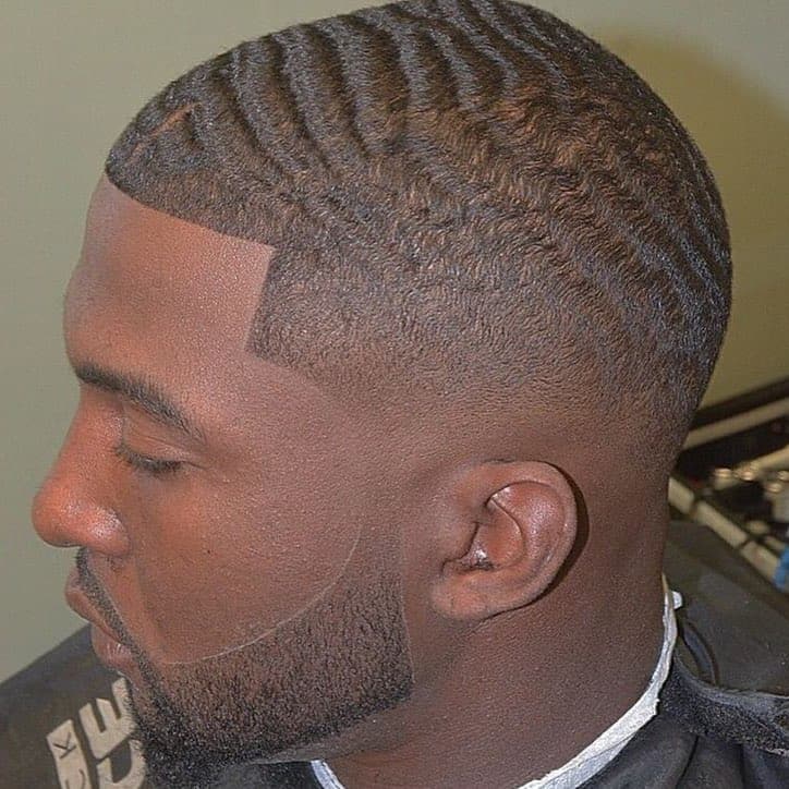 man with short wavy hair