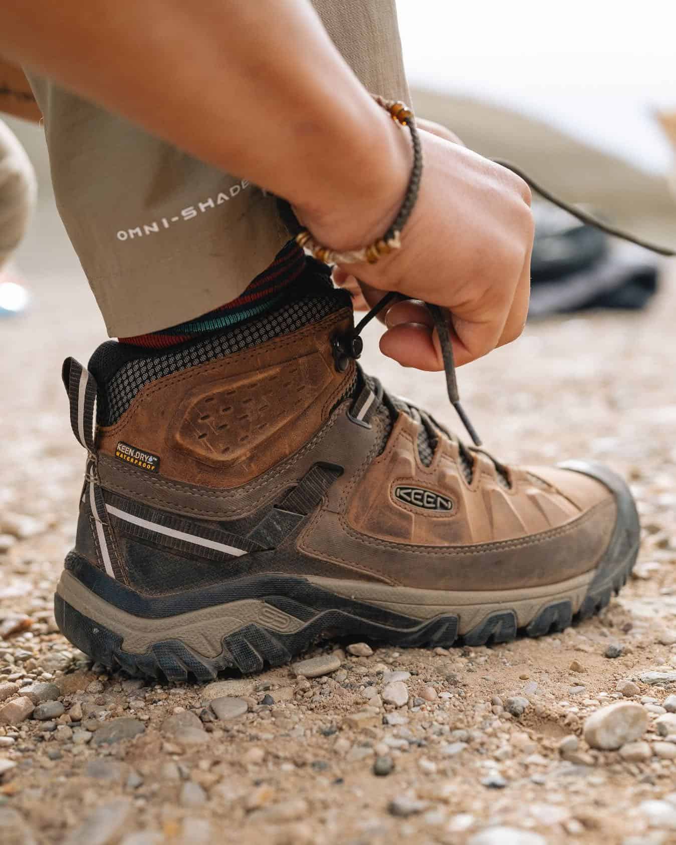 tying a lace of a boot