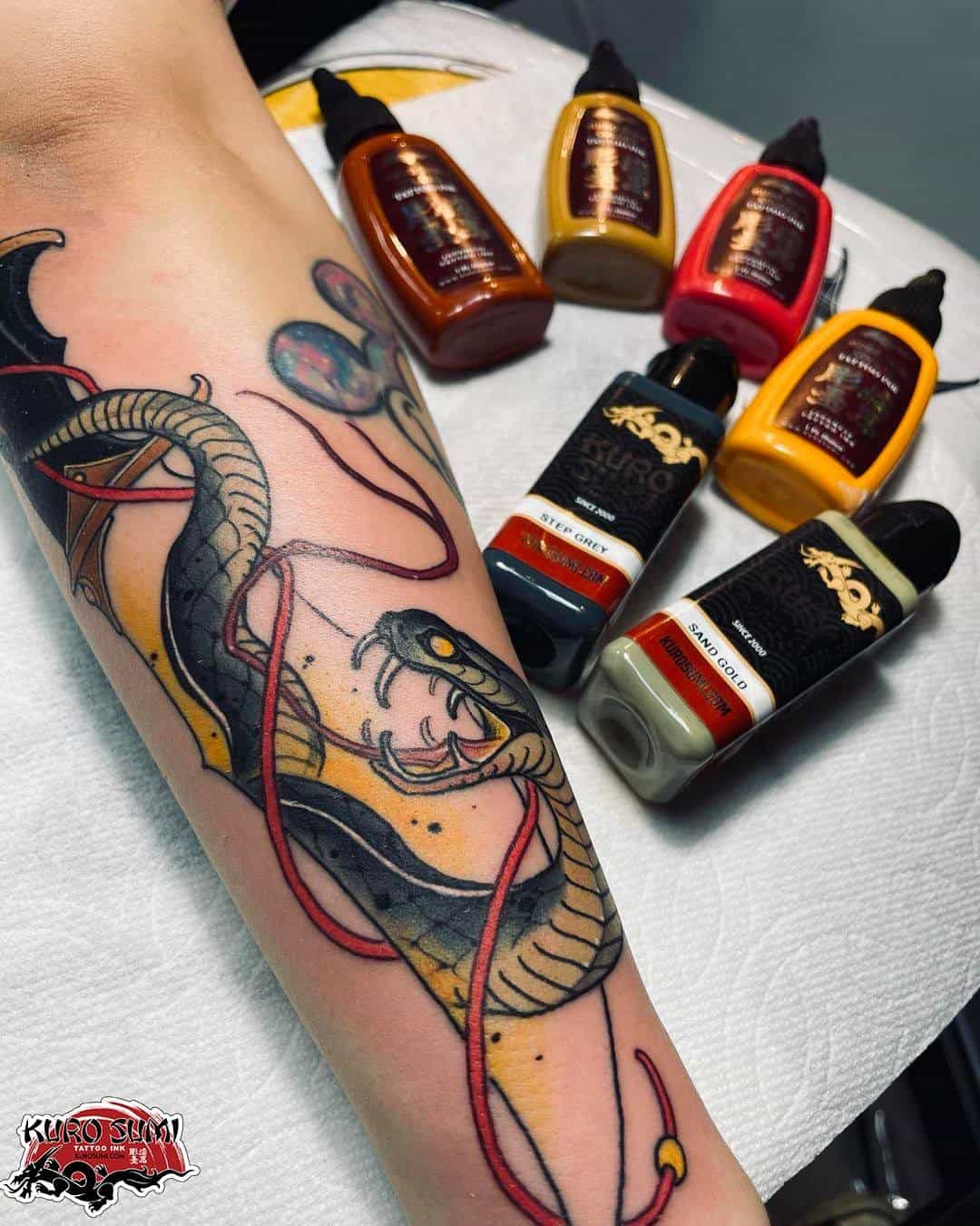 snake tattoo on arm