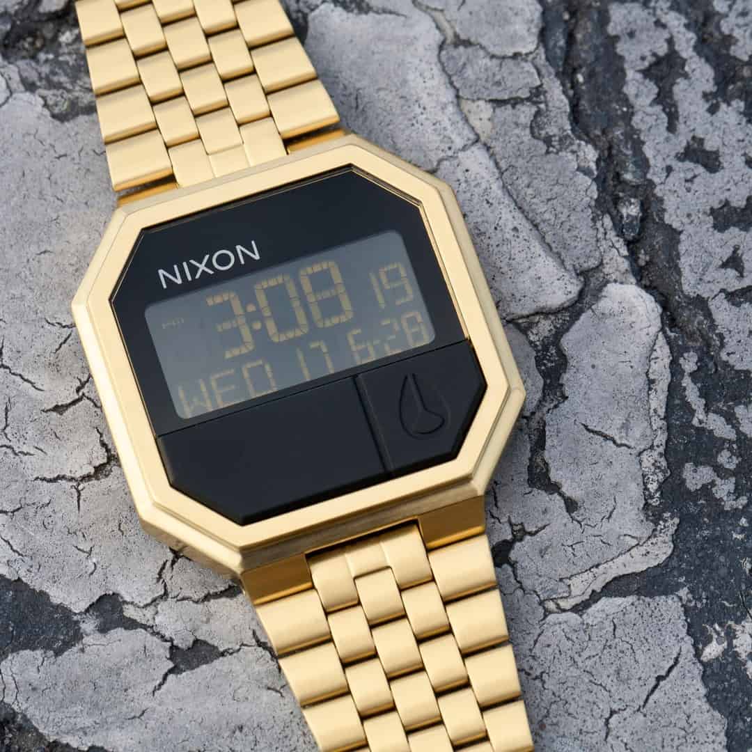 a gold Nixon Re-run watch