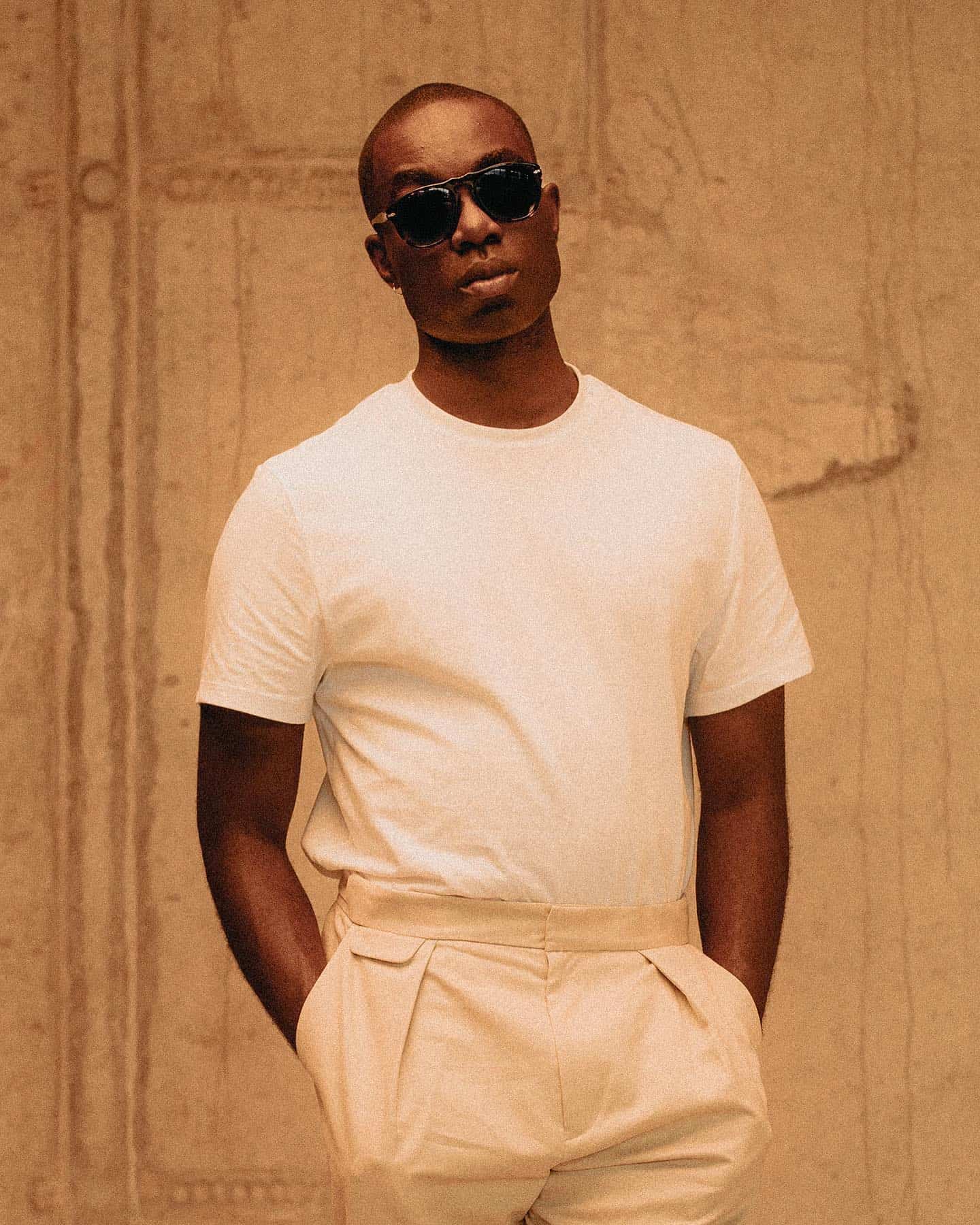bald man in dark glasses