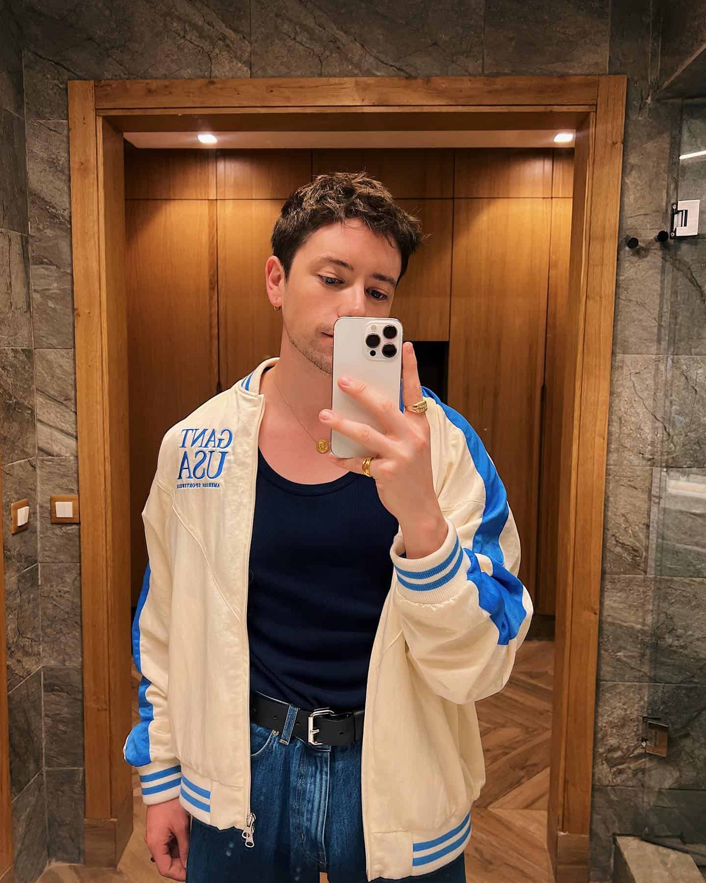 man taking a selfie in a mirror