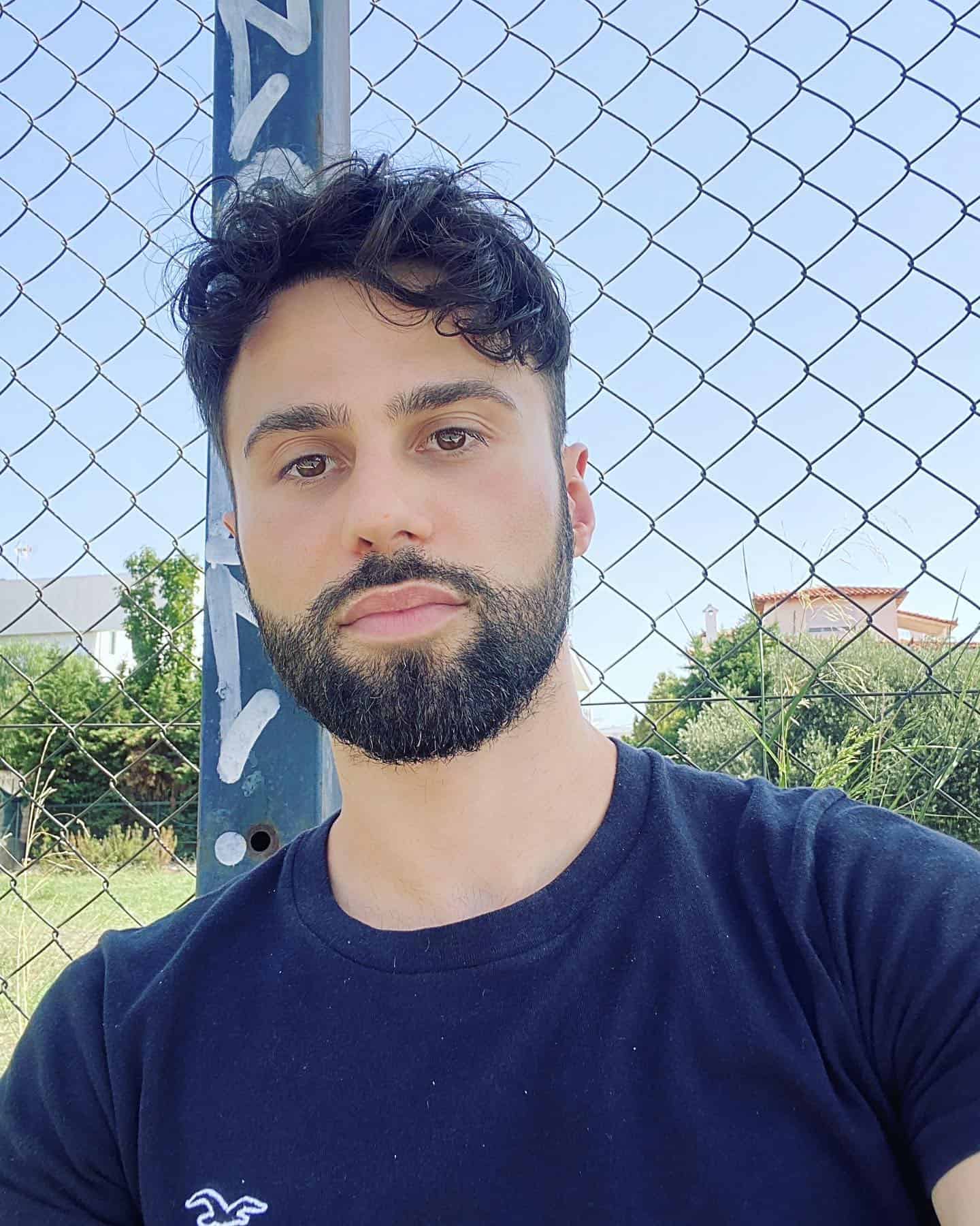 a man with wavy hair style
