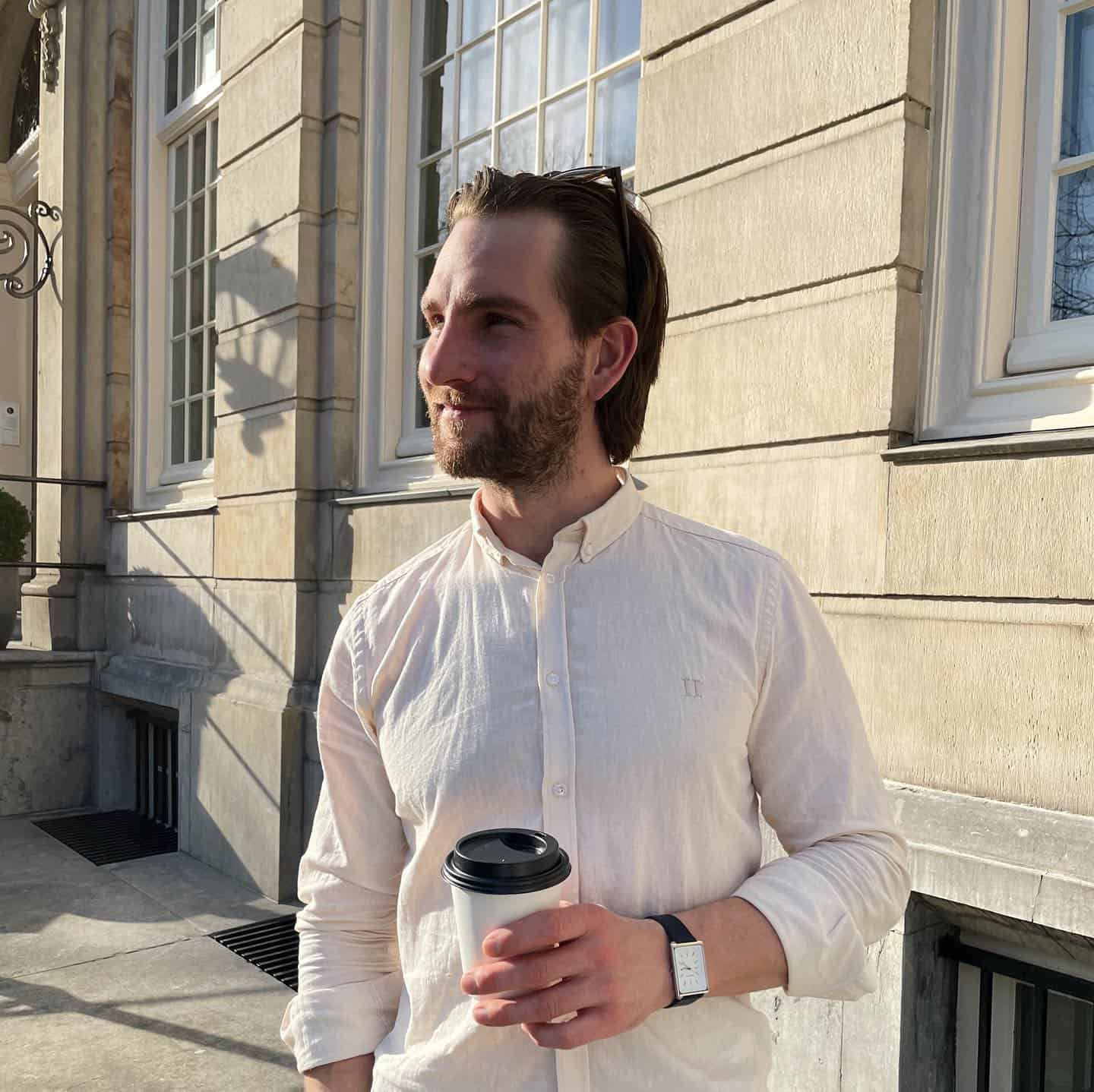 man enjoying his cup of coffee