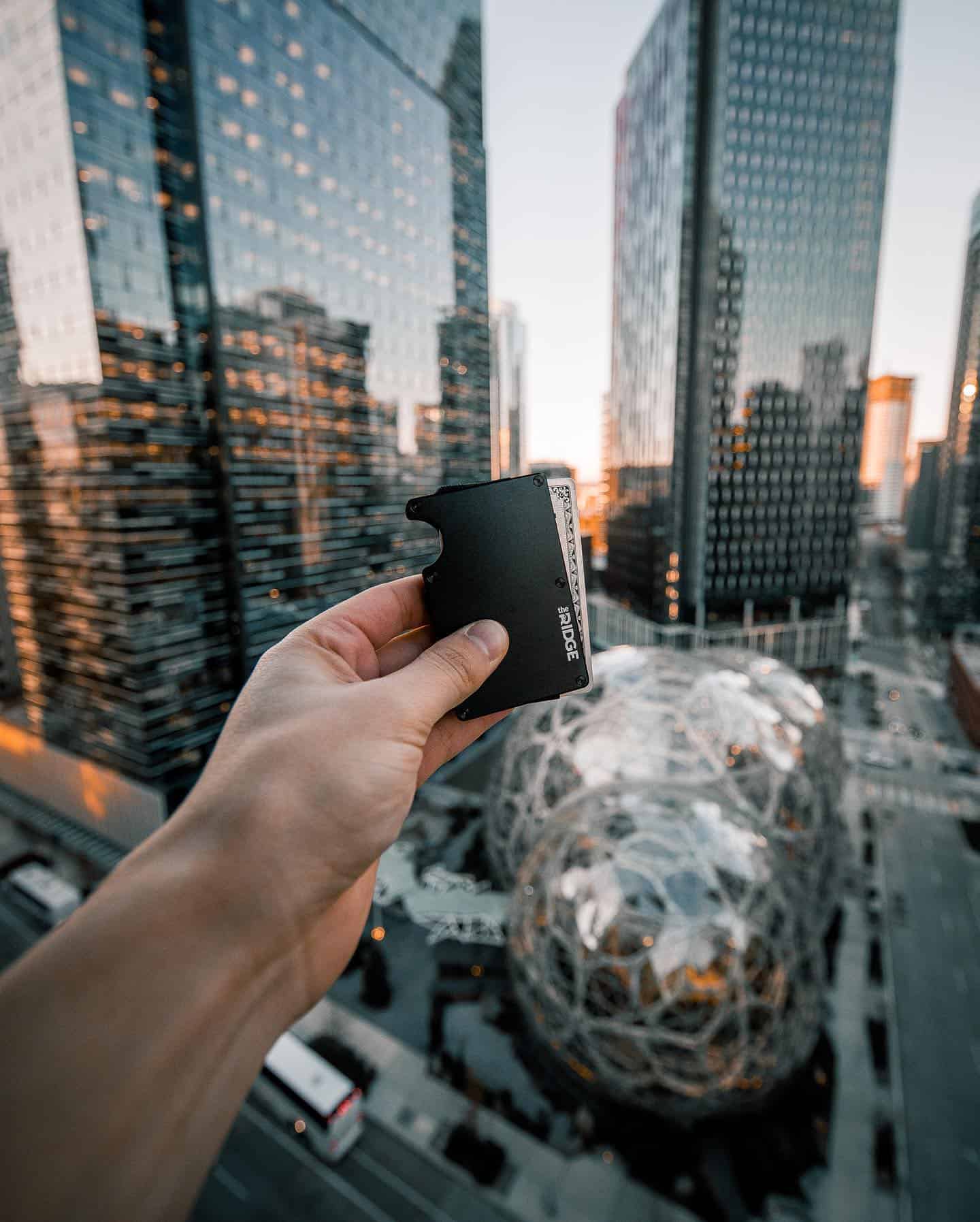 holding a ridge wallet