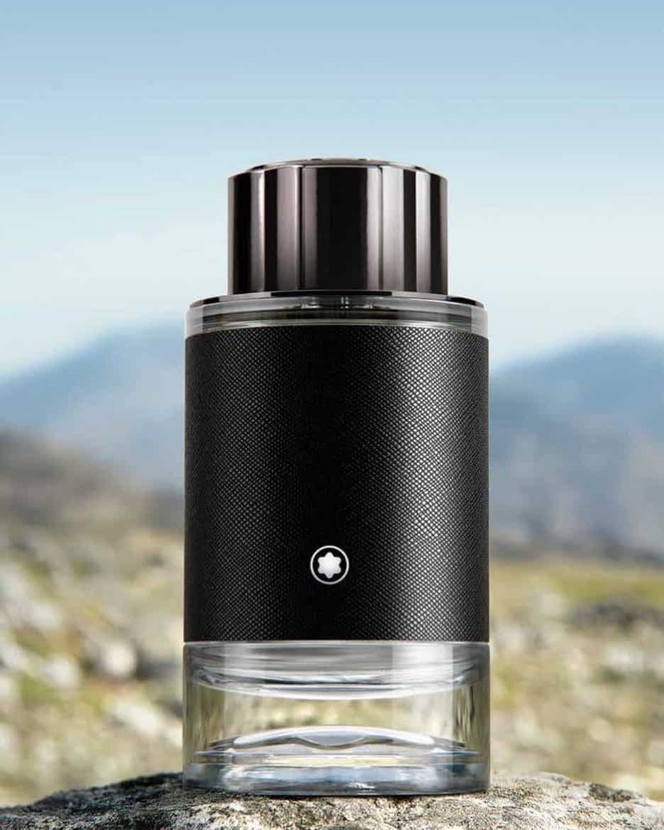 a bottle of mont blanc explorer on a rock