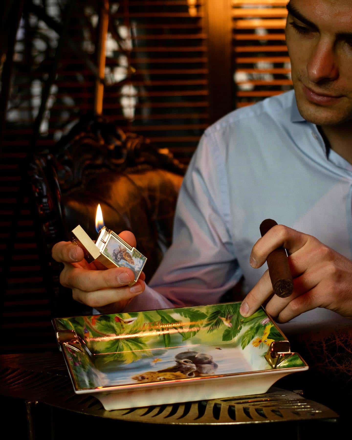 man with a cigar and a lighter