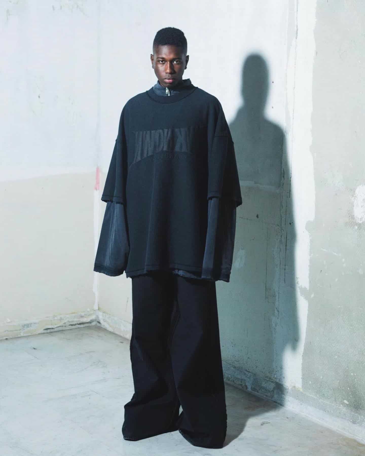man in an oversized outfit