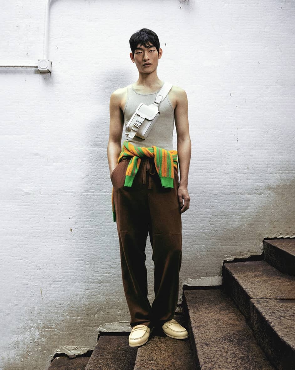 Man modeling pedro shoes and bag