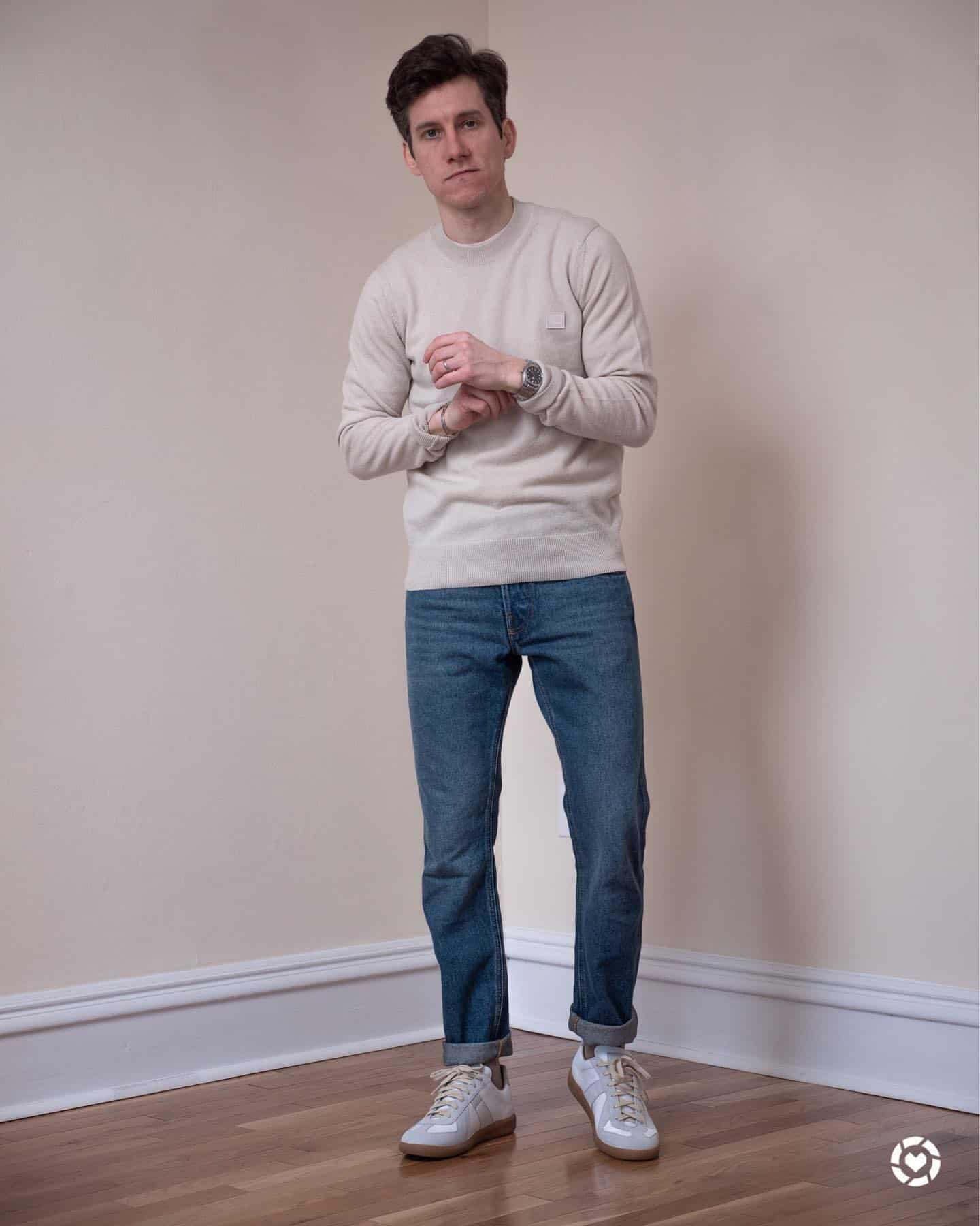 man in a matching color sweater and sneaker
