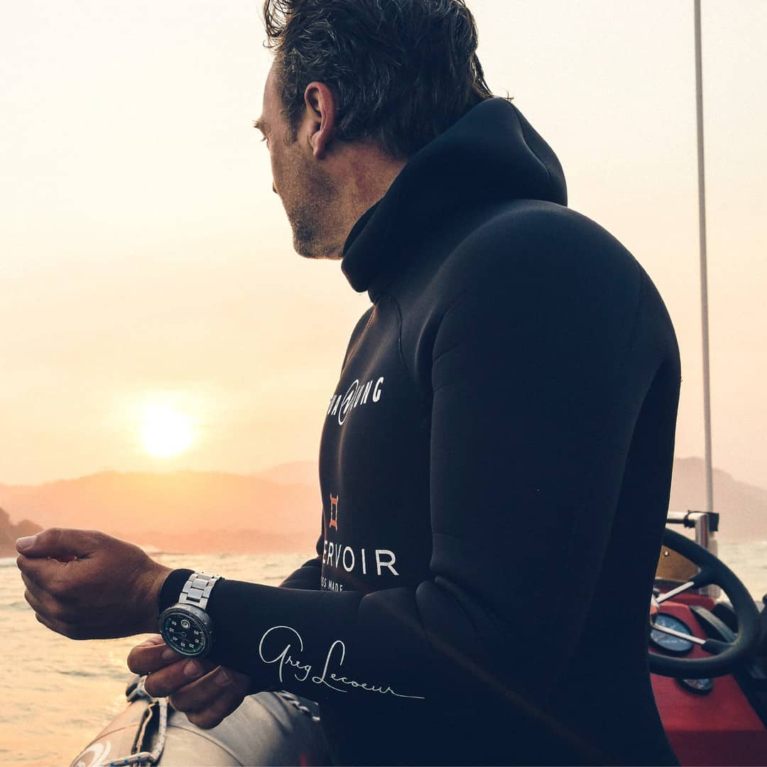 a diver wearing a Reservoir Hydrosphere watch
