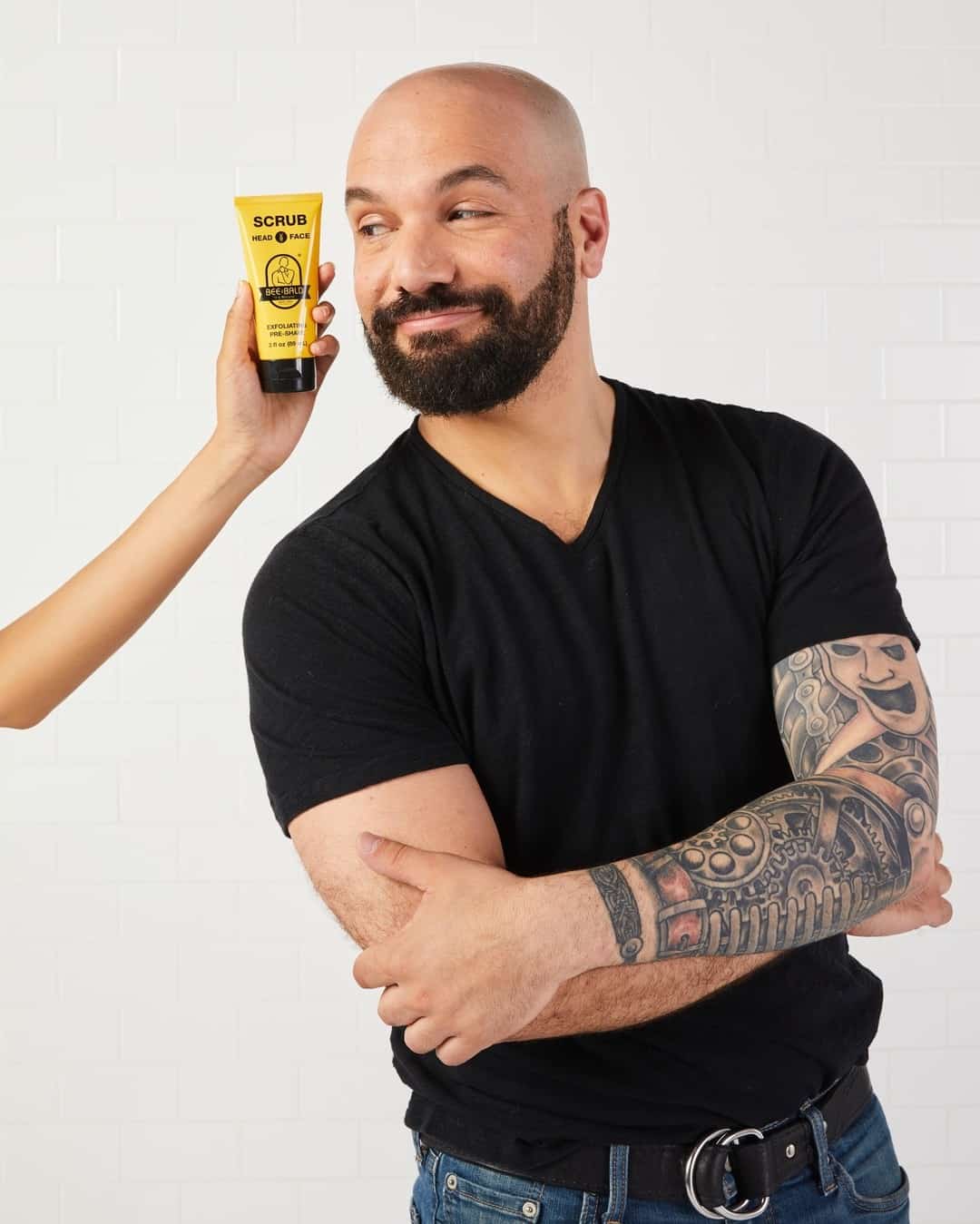 a bald man and his head shaving cream