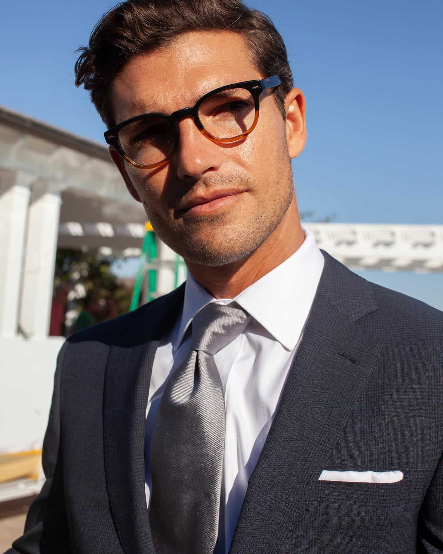man in a prince of wales suit