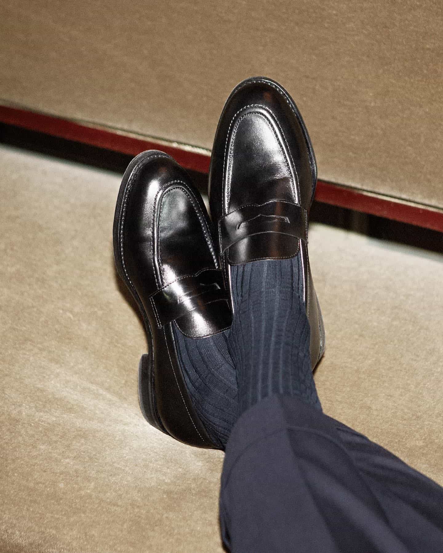 wearing a pair of myrqvist stenhammar black calf