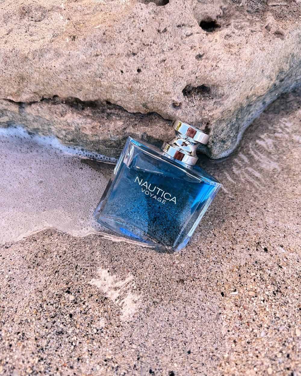 a bottle of nautica voyage washed on the beach