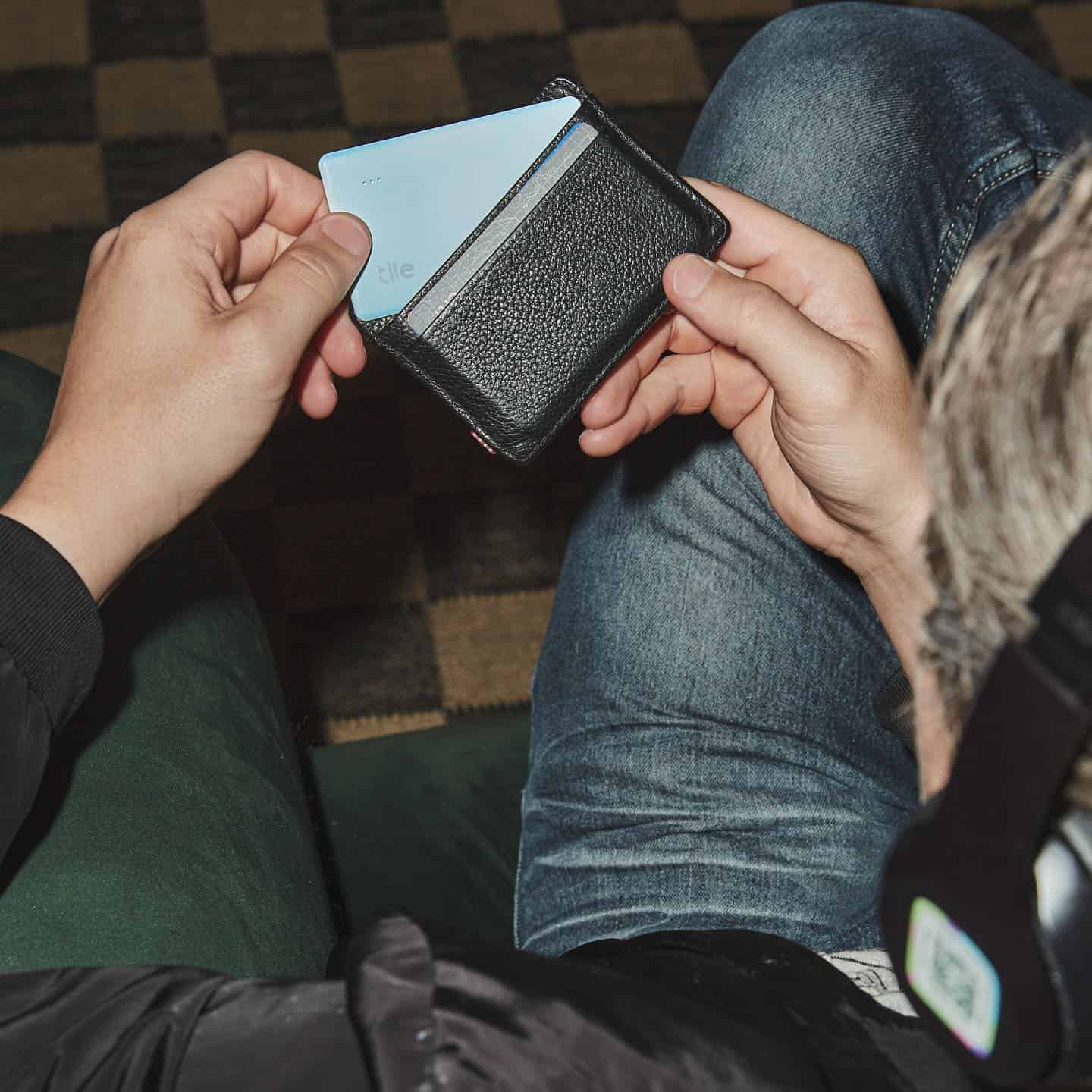 inserting a tile slim tracker in wallet