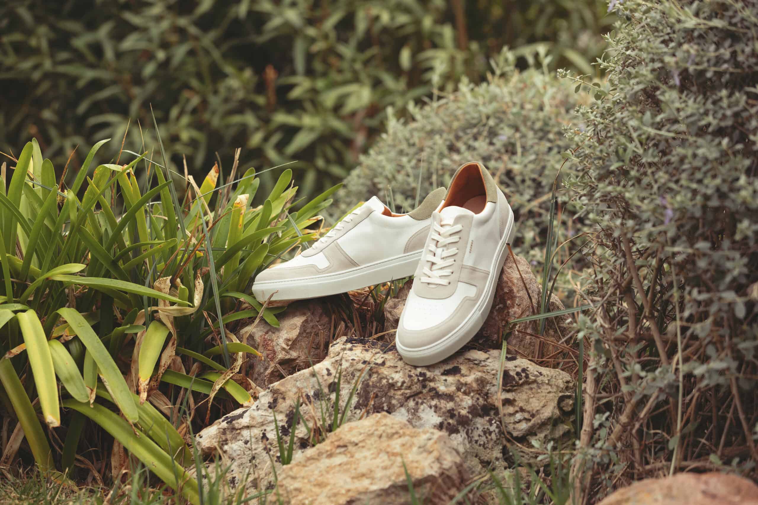 custom shoes from Hockerty sitting on a rock outside