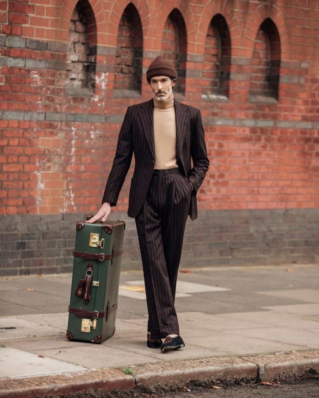 a man and his classic luggage