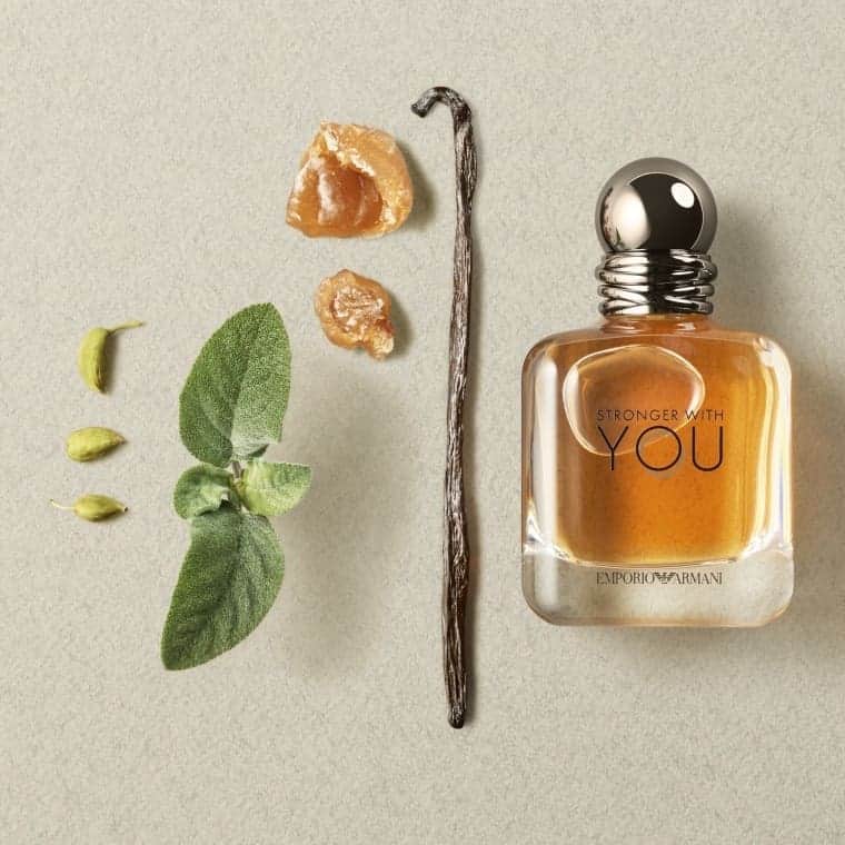 a bottle of Emporio Armani stronger with you and raw ingridients