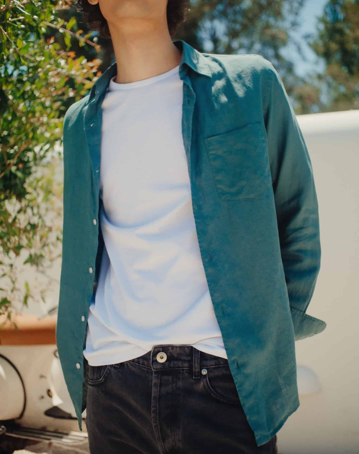 man wearing a classic isto crew neck under a shirt