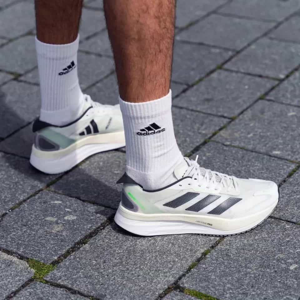 man wearing a pair of addidas Adizero