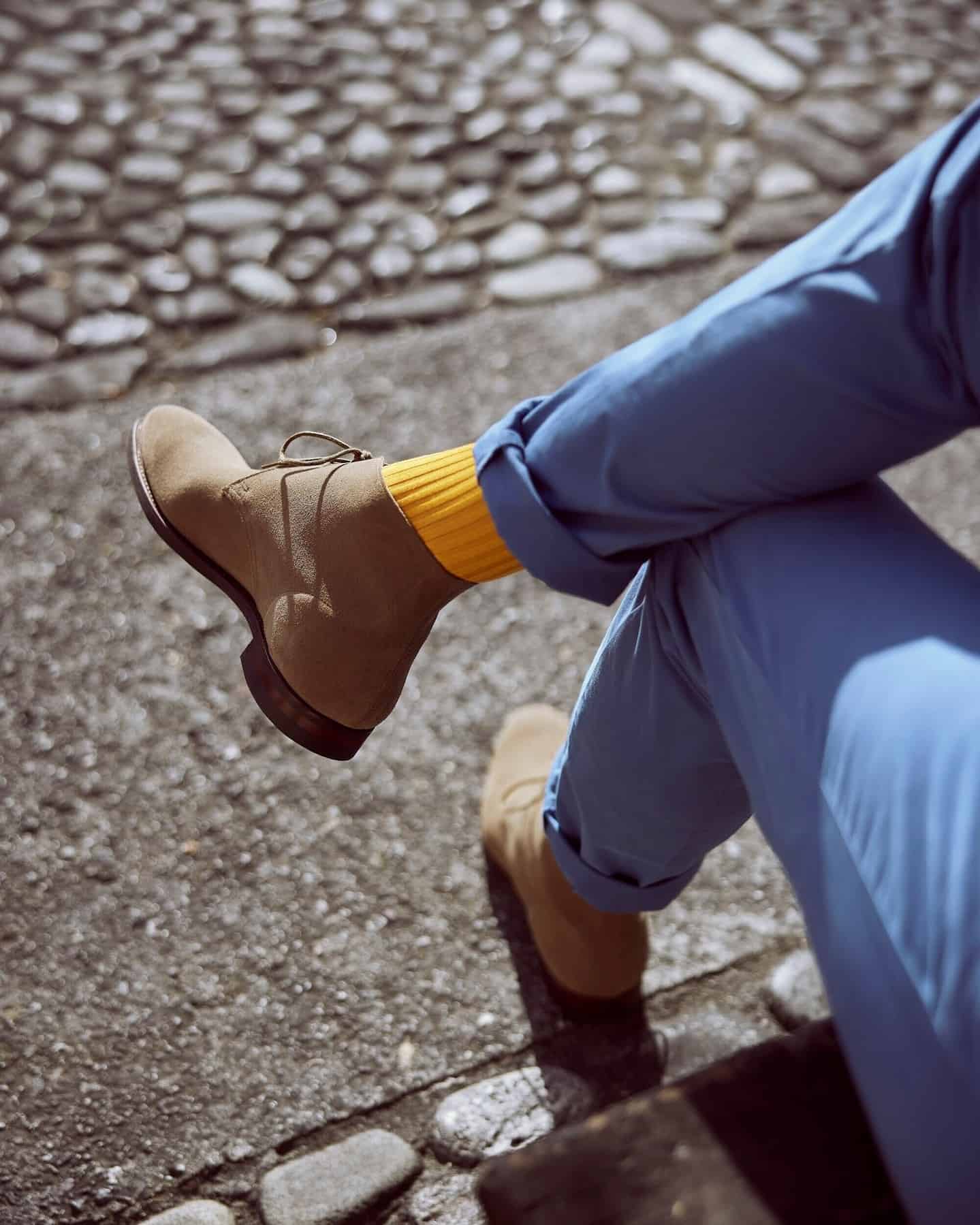 wearing a yellow sock for a brown suede boots