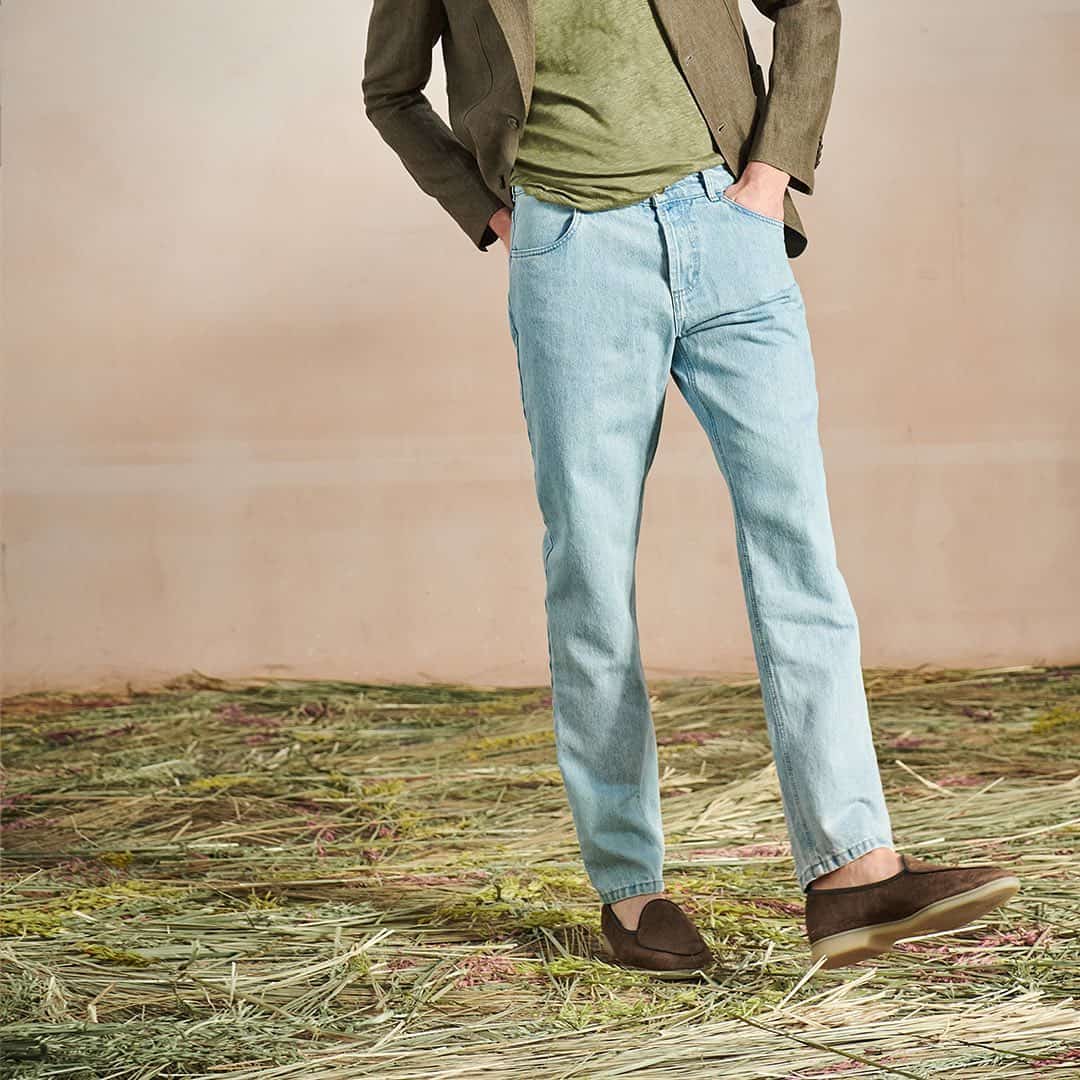 man wearing a pair of light blue jeans by luca faloni