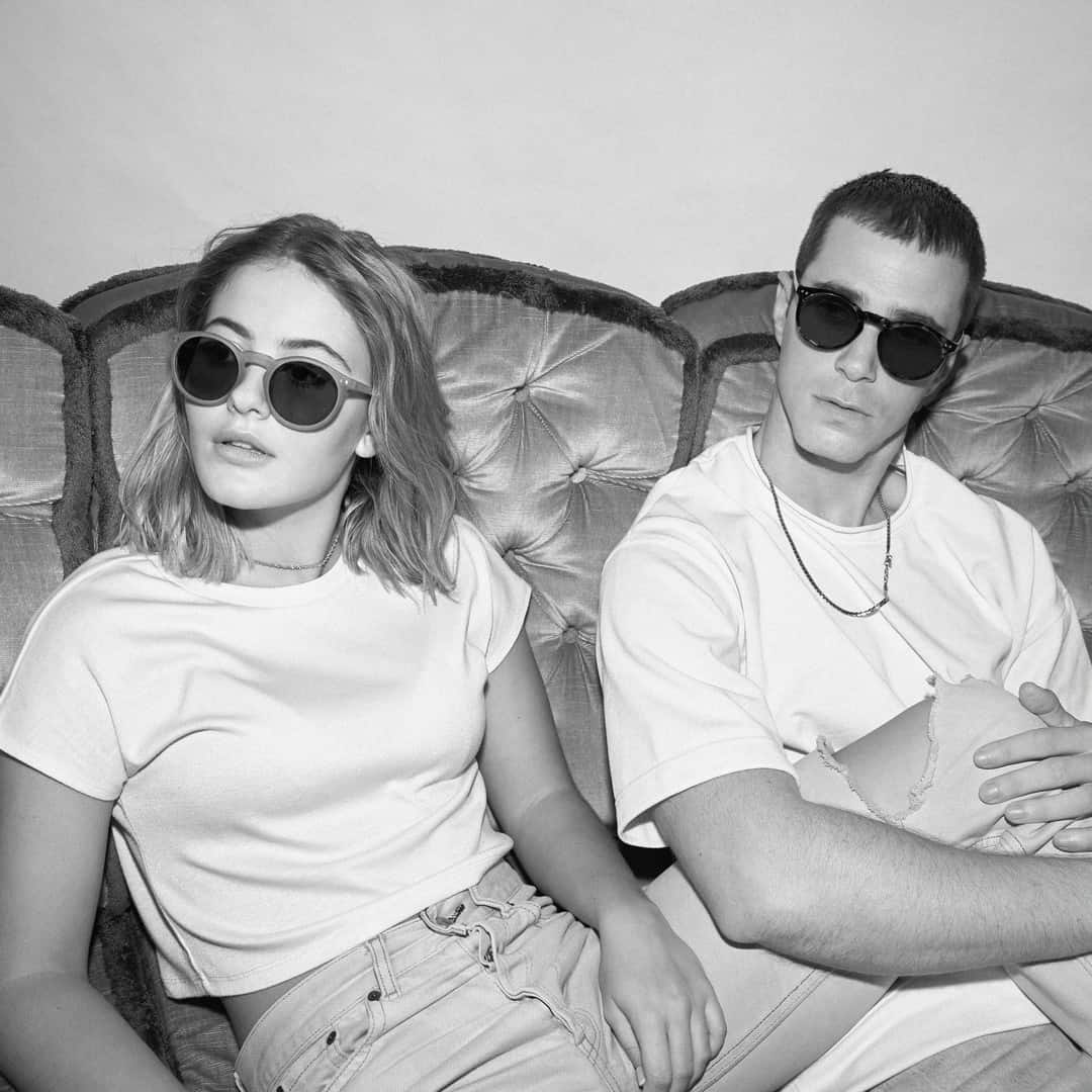 coupleonthecouchbothwearingsunglasses