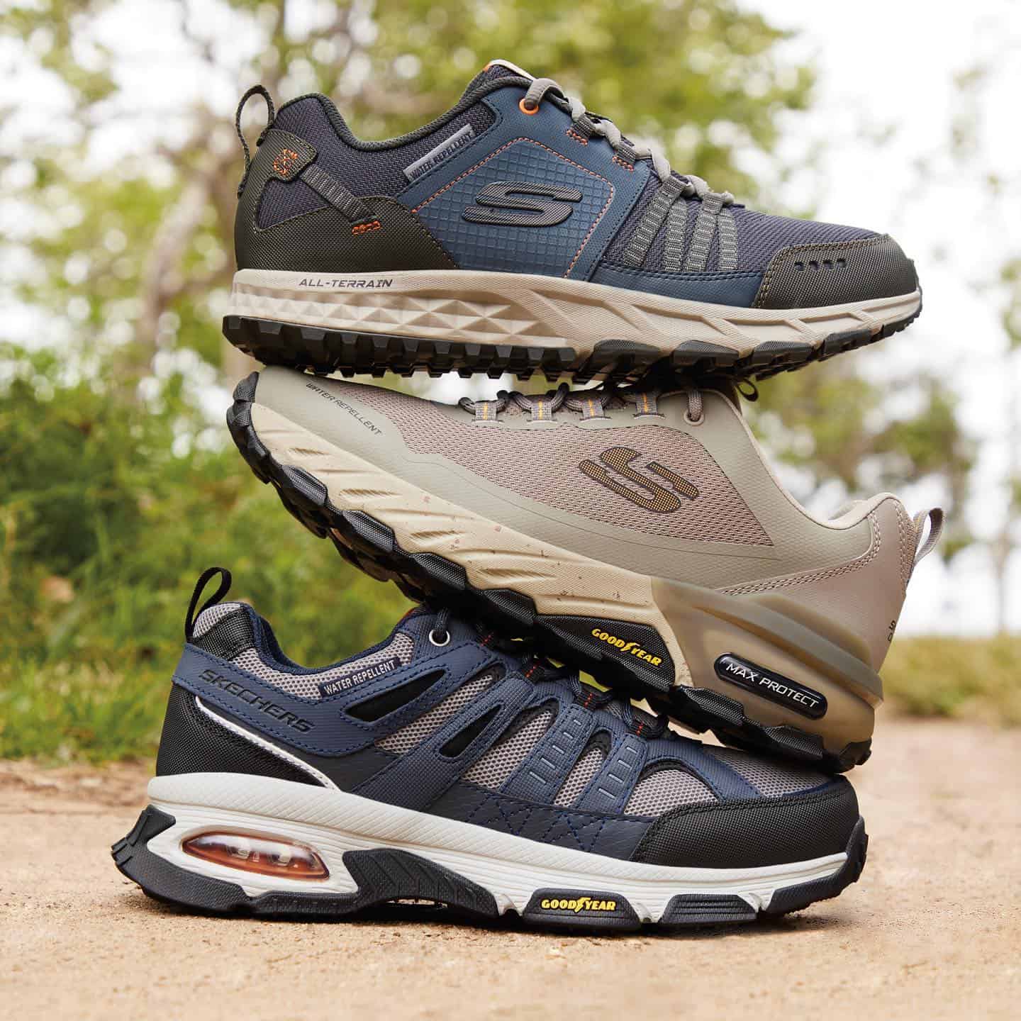 a pile of skechers sneakers