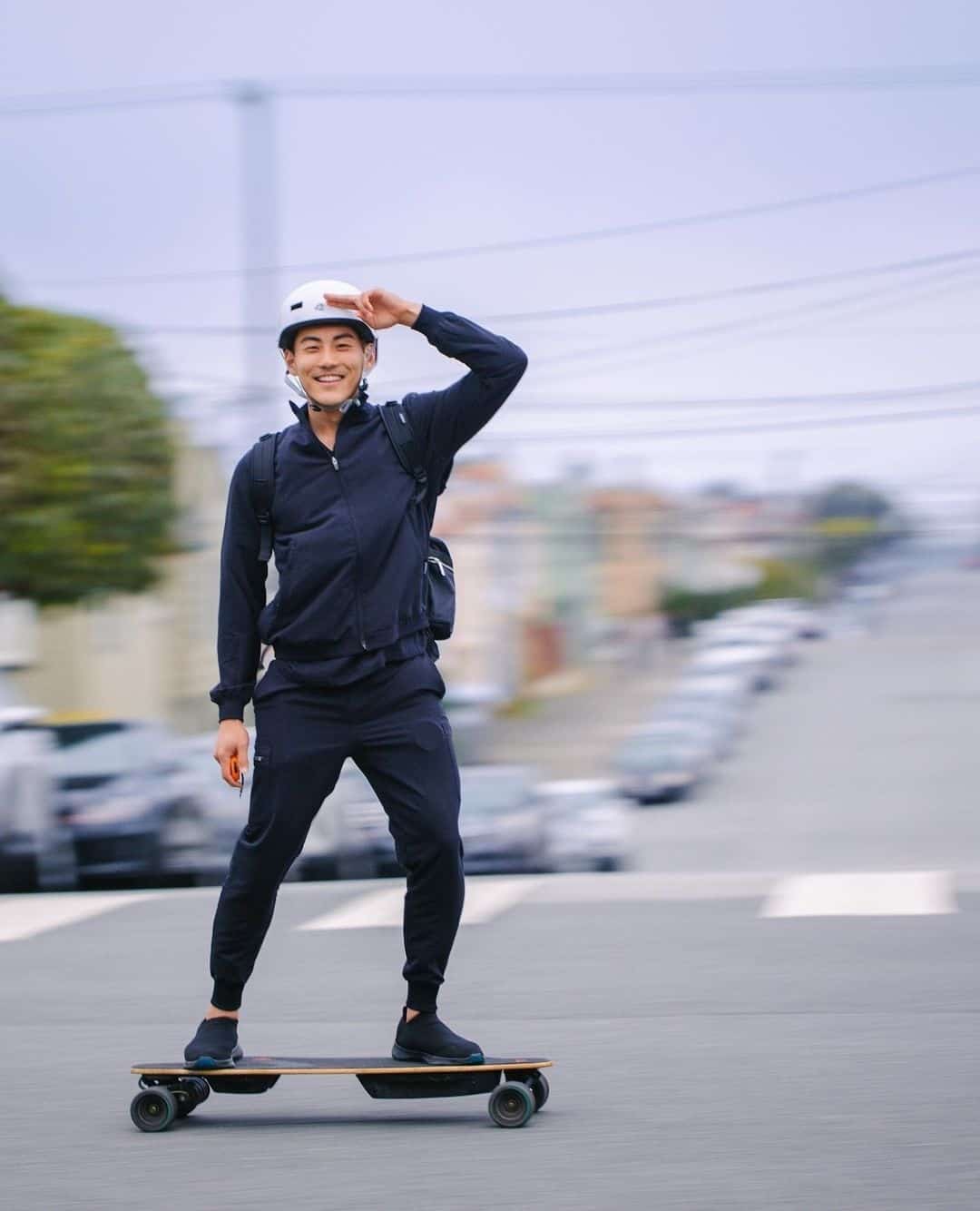 man riding an electric skateboard
