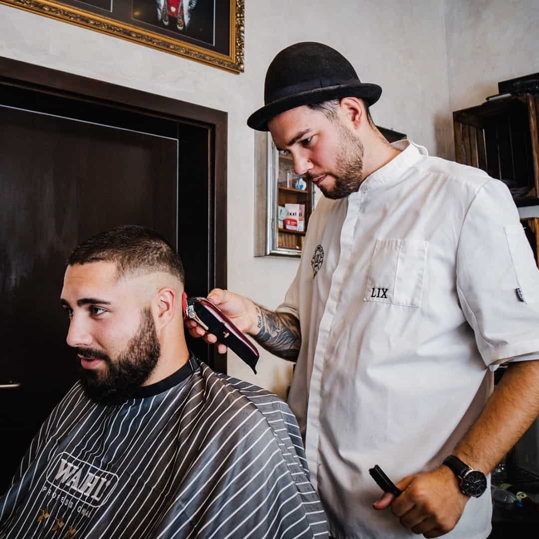getting a clean haircut from a professional barber