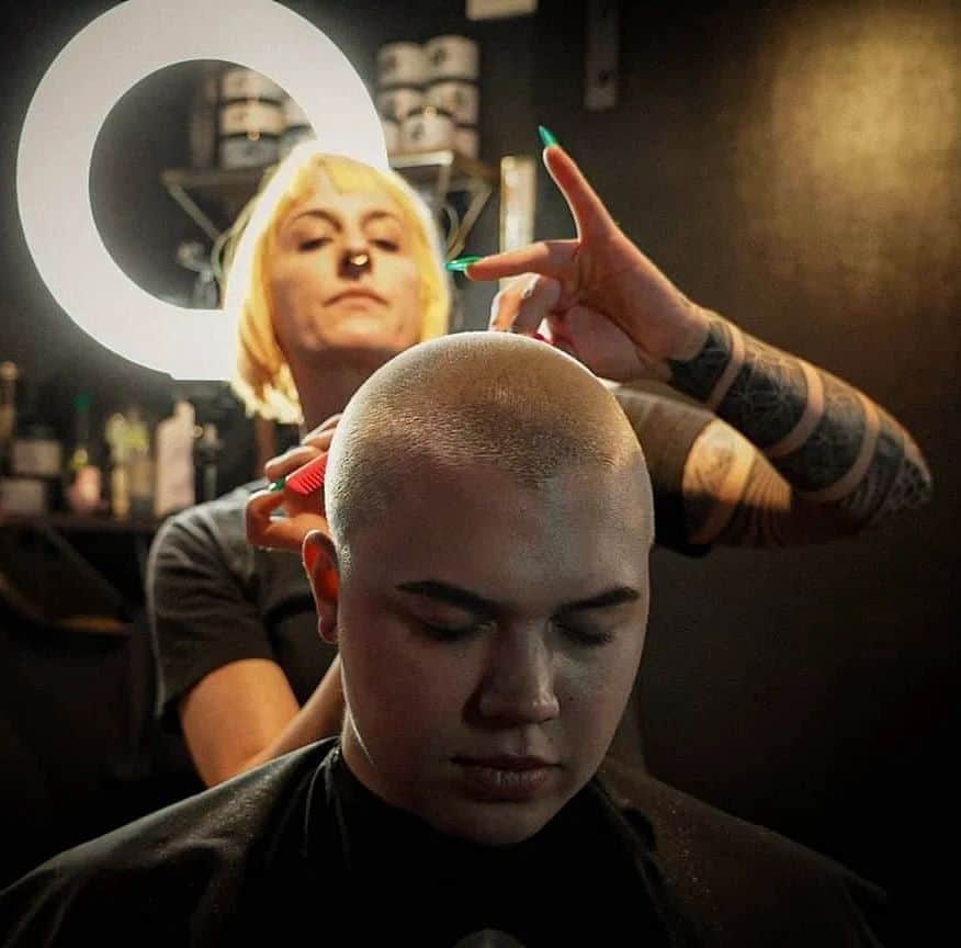 getting a haircut from a professional