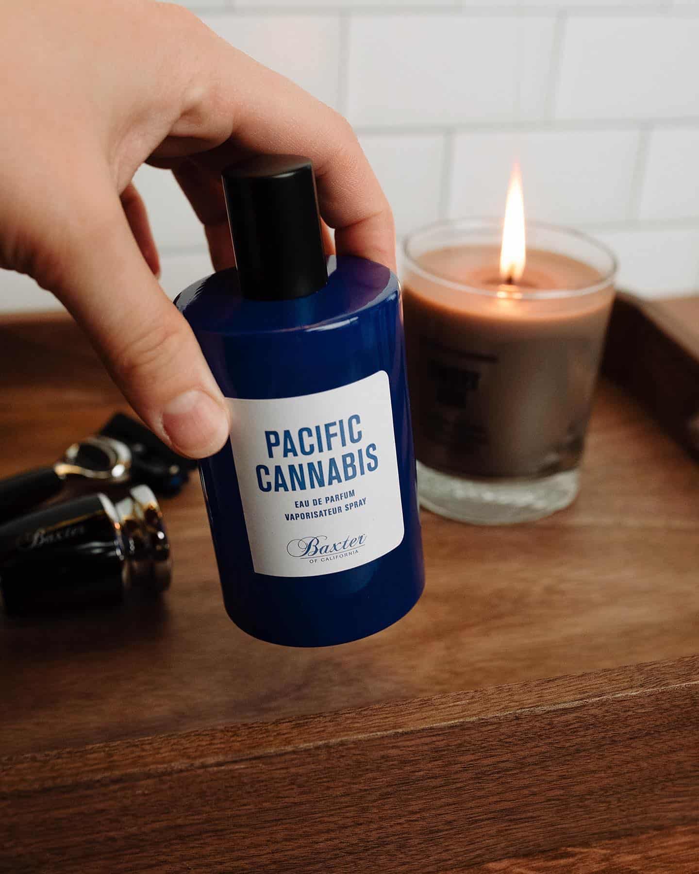 holding a bottle of pacific cannabis by baxter of california