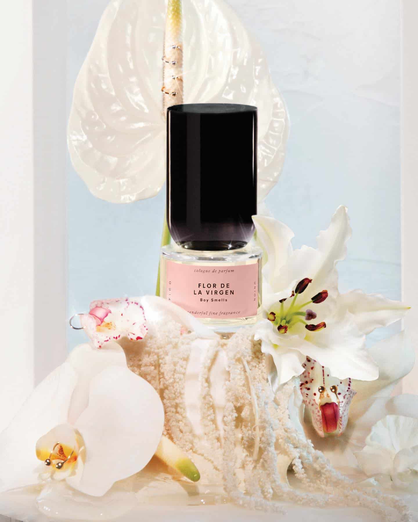 a bottle of Flor De La Virgen by Boy Smells with flowers