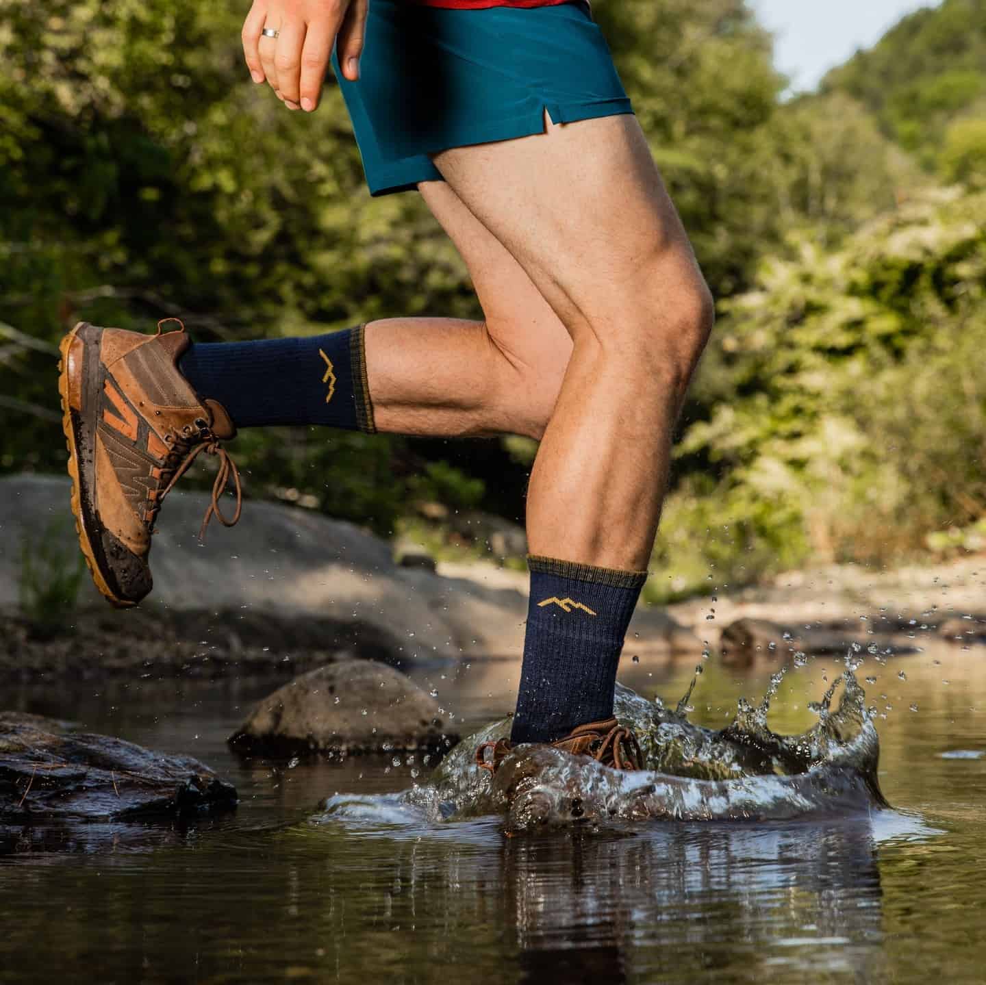 man jumping into water