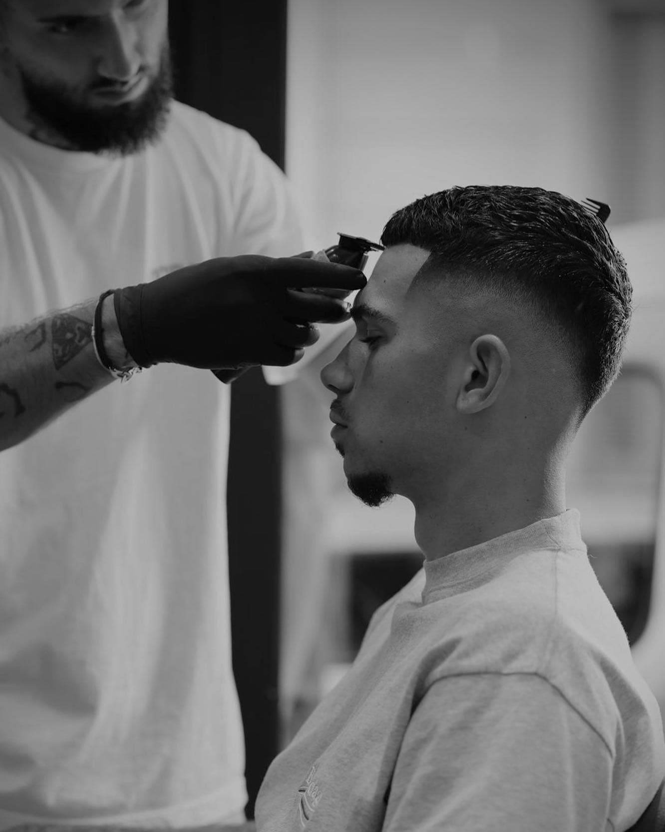 man getting his bangs straight