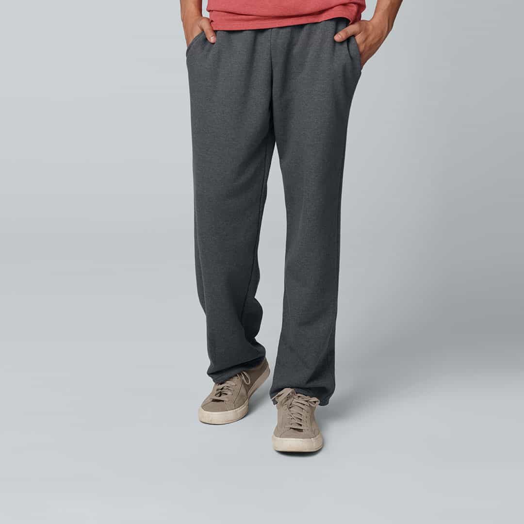 man wearing a pair of fleece joggers by fruit of the loom