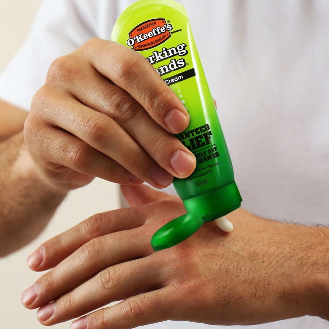 applying o'keeffe's working hand cream