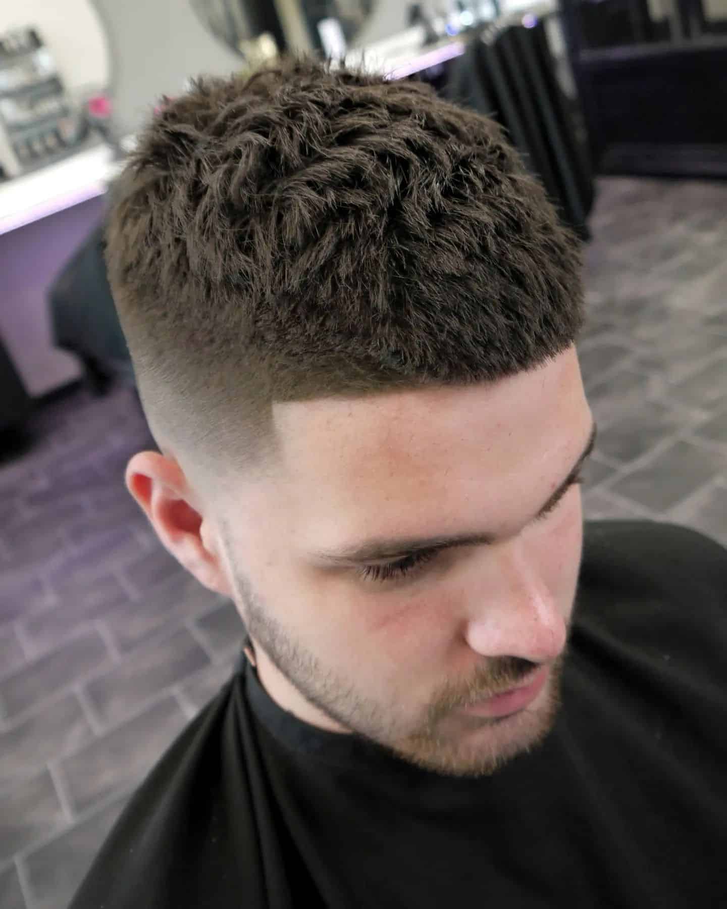 fresh haircut with beveled hairlines