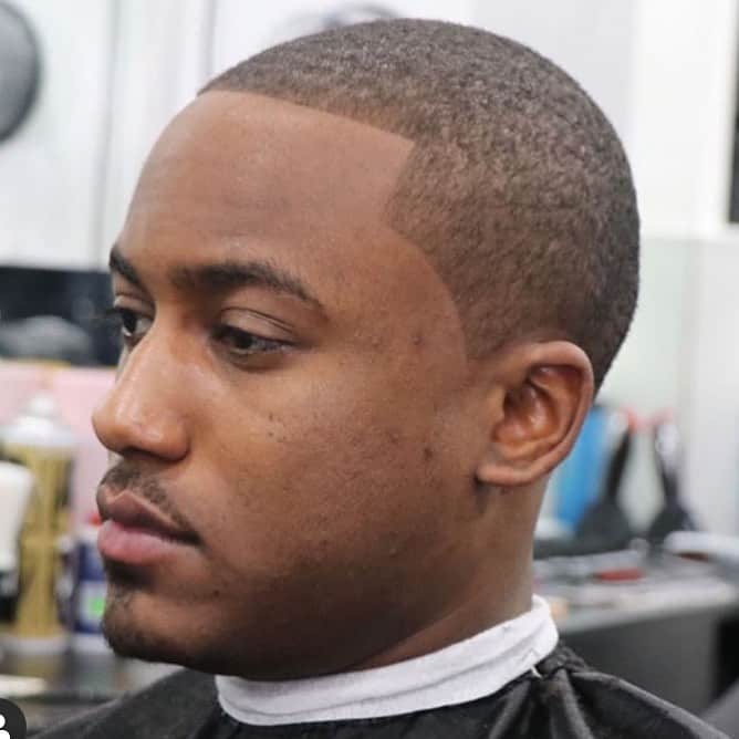 man with a flush cut hairstyle