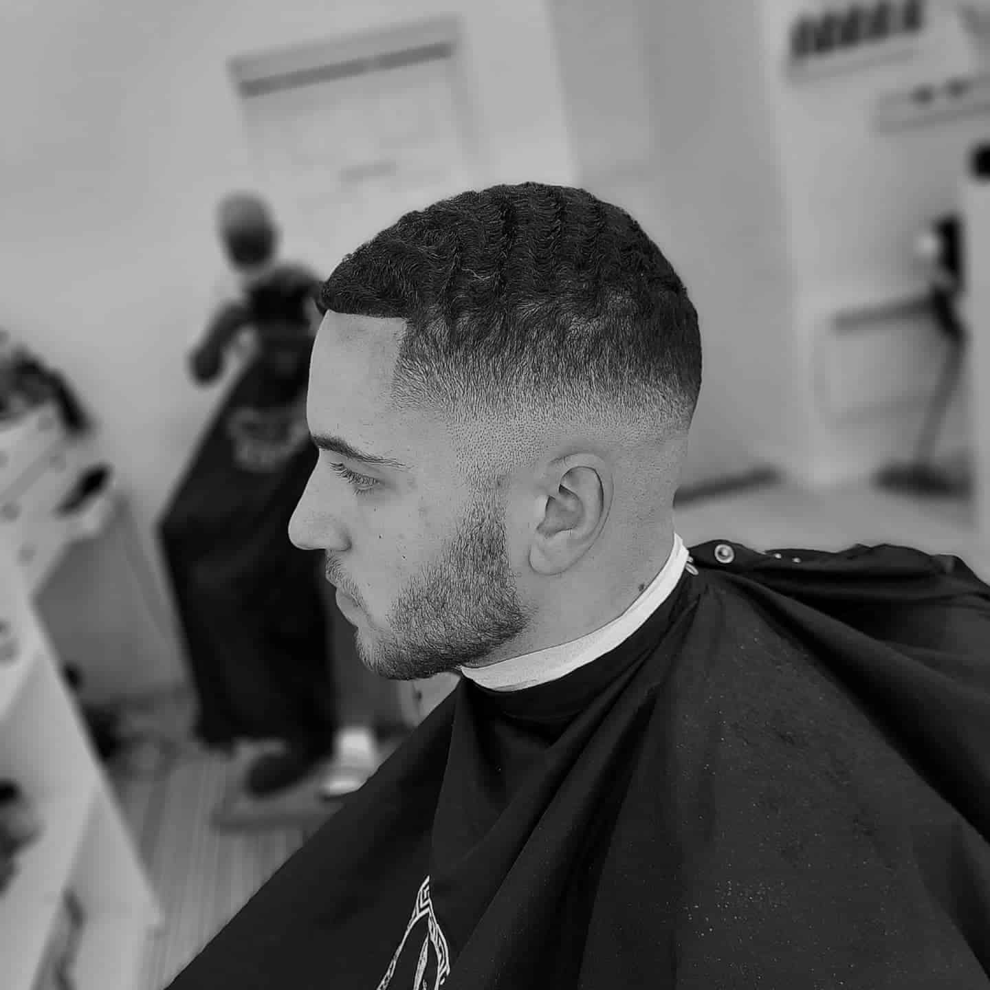 man with a number 3 skin fade haircut