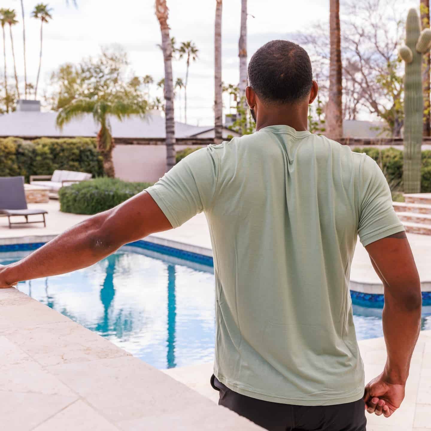 man looking at the pool