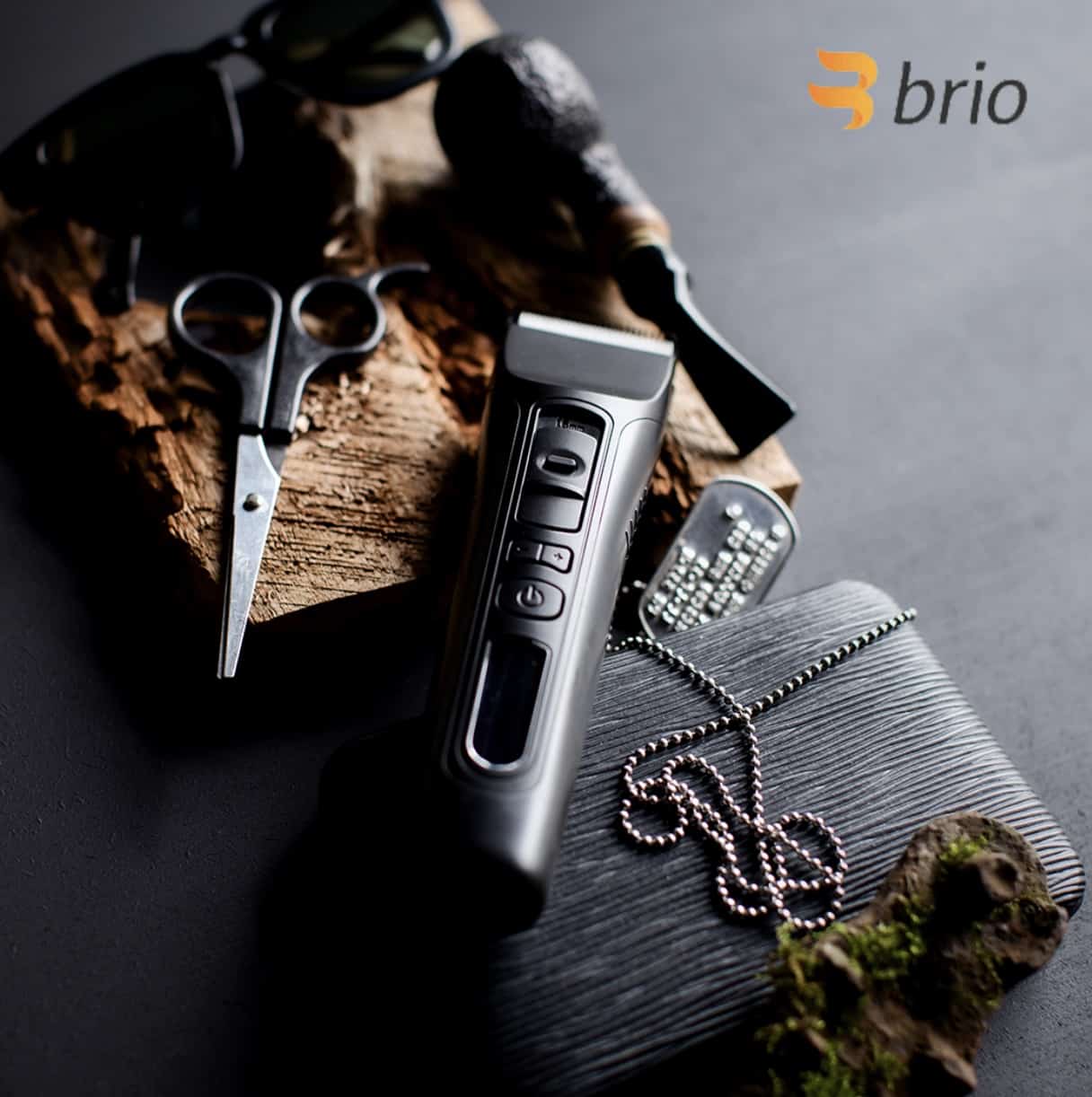 flatlay of beardscape with scissors and dog tags