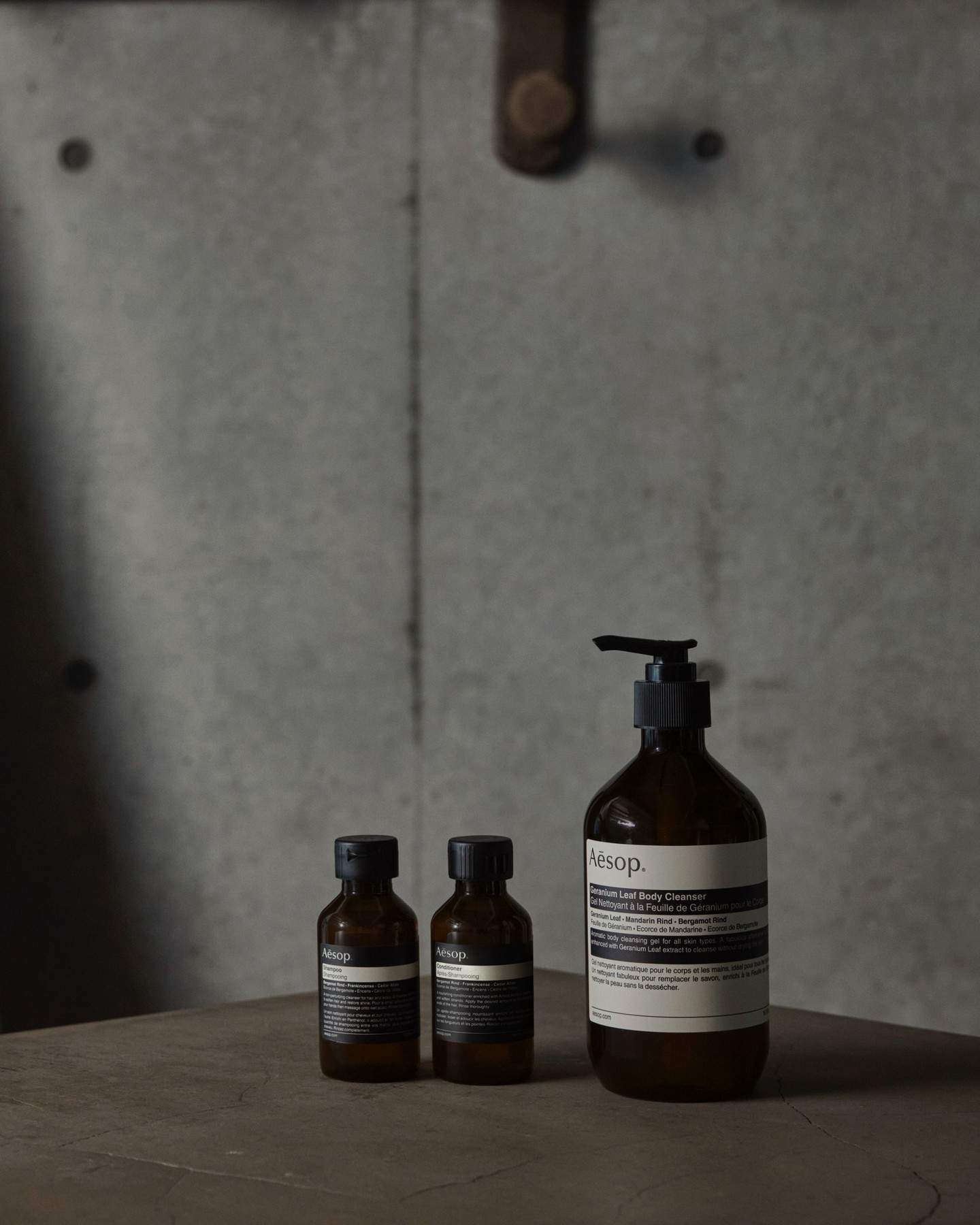 bottles of shower essentials by aesop