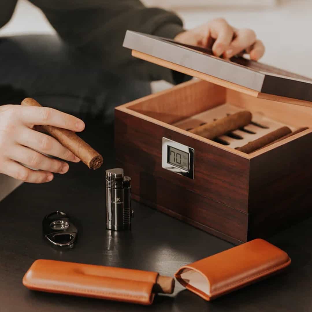 man using a humidor for cigar storage