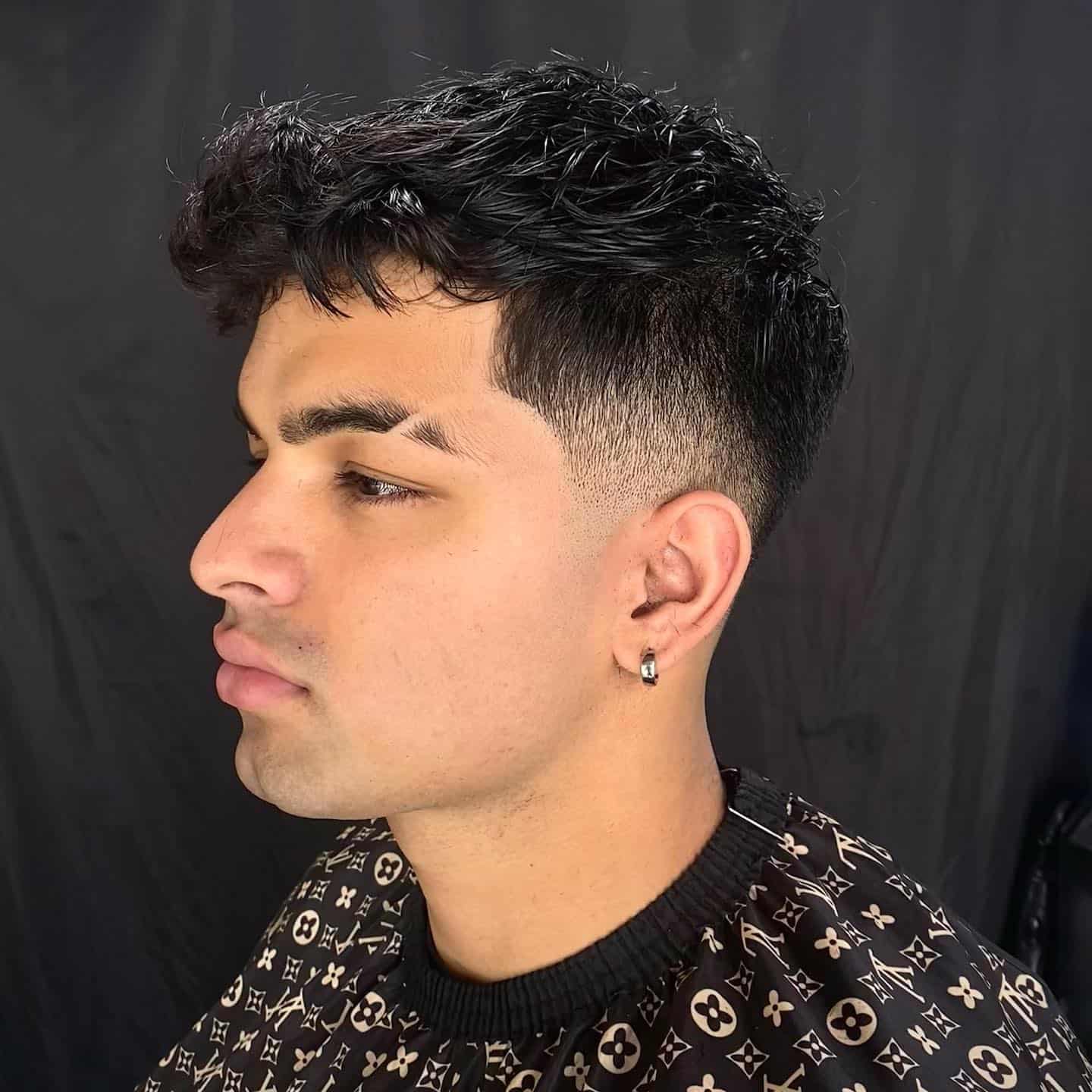 man with fresh drop fade with eye brow slit