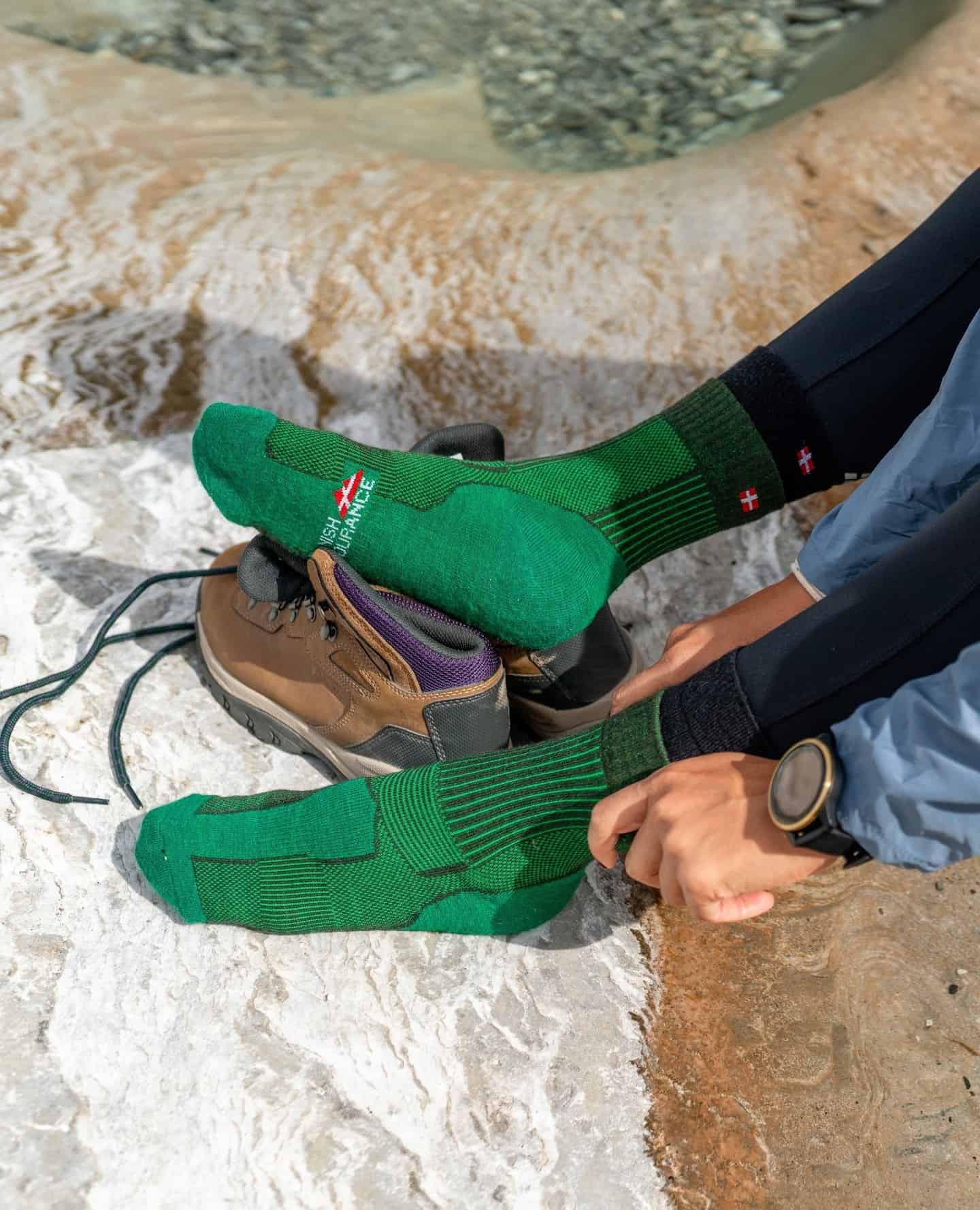 man wearing a pair of green hiking socks
