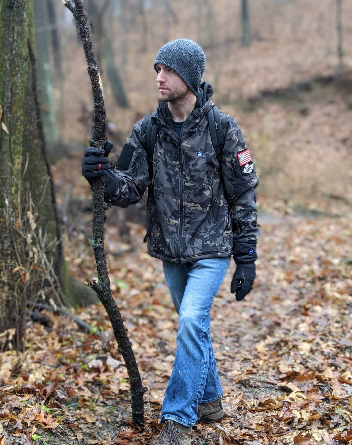 man hiking in the woods